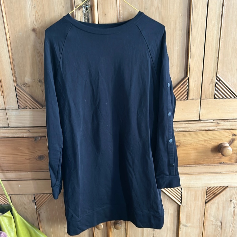 Athleta black dress with snap detailing on the arms